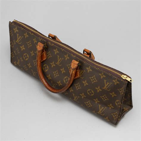 triangle Louis Vuitton handbags